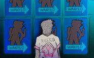 A digital drawing of Arturo Huerta from behind, a silhouette filled with static wearing a bleached white Garages jersey with reddish pink faded dye on the logo and blueish tint at the bottom. You only see the back of his head as he stares at 6 glowing posters in front of him showing the silhouette of Goodwin Morin and blue arrows below her that read WANTED. The scene is dim except for a sickly blue light from above.